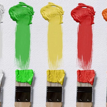 Paintbrushes with colorful paint strokes.