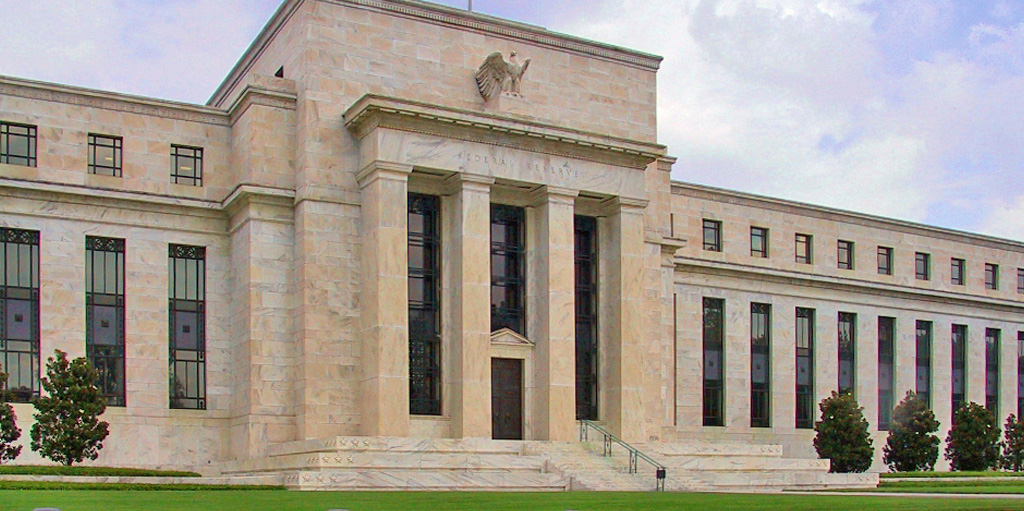 FED CUTS RATES BY HALF A PERCENTAGE POINT